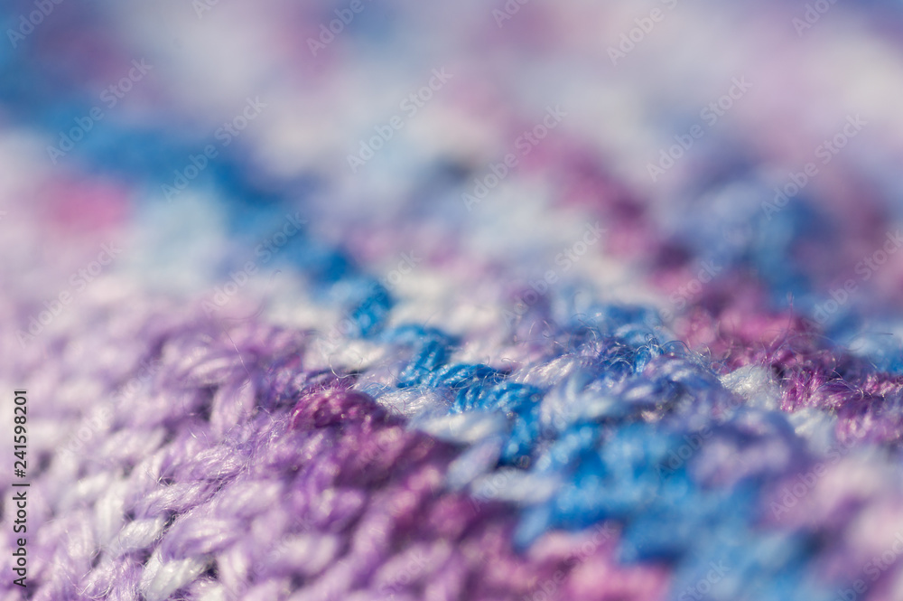 Seamless knitted patterns in pastel colors fragment of ready handmade cloth and melange colored yarn