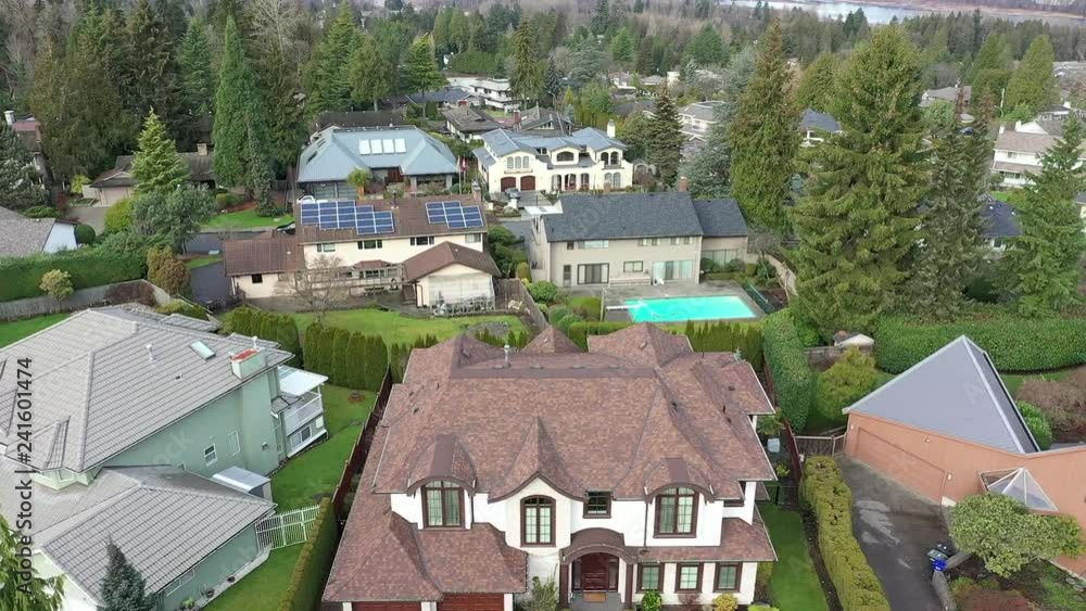 A perfect neighbourhood. Houses in suburb at Summer in the north America. Luxury houses with nice landscape. Aerial drone view. A perfect neighbourhood. Houses in suburb at Summer in the north America. Luxury houses with nice landscape. Aerial drone view.