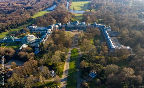 Beautiful Aerial View of Castle of Laeken palace, official royal family residence, around Royal Domain of Laeken park, feat. Orangery Greenhouse in Brussels Belgium