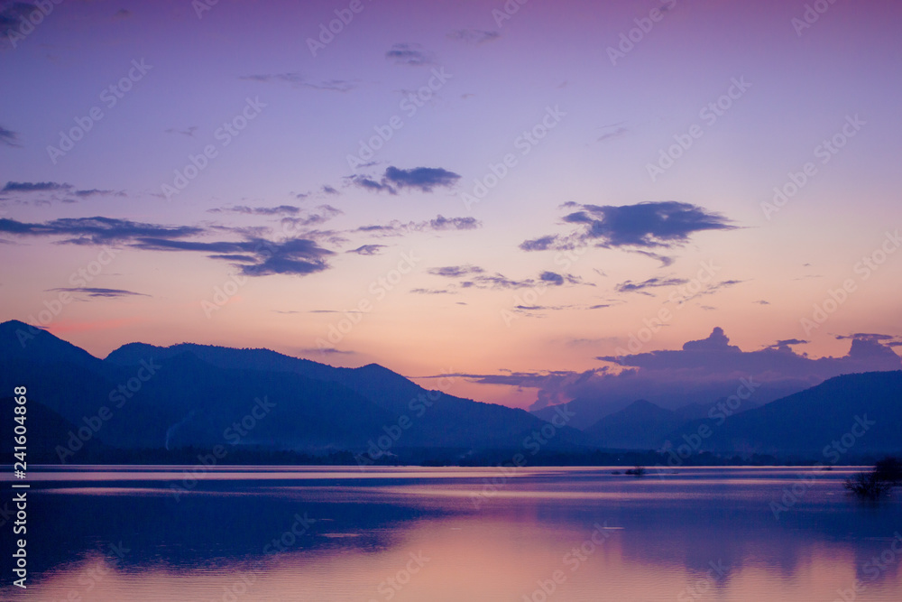 Obraz premium Beautiful Landscape of evening lake view that show The reflection of the mountain on the water is so beautiful.