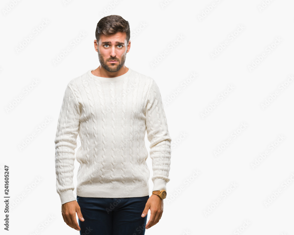 Young handsome man wearing winter sweater over isolated background depressed and worry for distress, crying angry and afraid. Sad expression. Young handsome man wearing winter sweater over isolated background depressed and worry for distress, crying angry and afraid. Sad expression.