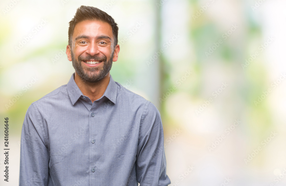 Adult hispanic man over isolated background with a happy and cool smile on face. Lucky person. Adult hispanic man over isolated background with a happy and cool smile on face. Lucky person.