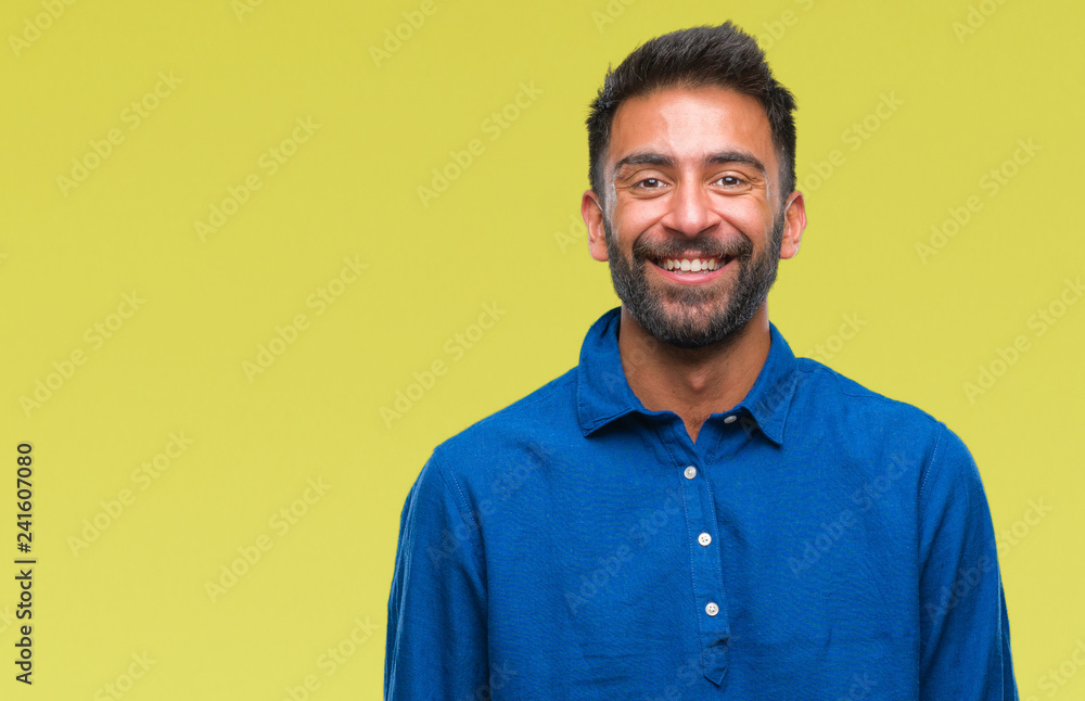 Fototapeta premium Adult hispanic man over isolated background with a happy and cool smile on face. Lucky person.