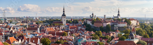 Bright colourful aerial shot of old town of Tallinn, Estonia at sunny day. A very vide panoramic.