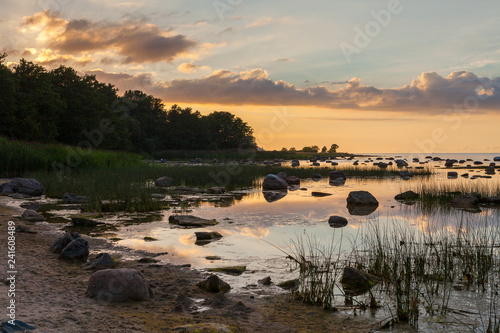 Fototapeta Naklejka Na Ścianę i Meble -  Colors of sunset over the rocky sea shore. Estonia, Baltic sea, summer time.