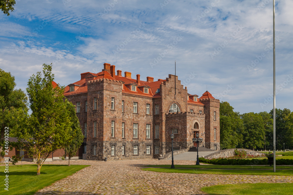 View of the old manor Calvi (Kalvi) in Ida-Viru County, Estonia. Close to town Aseri, Estonia. Summertime. View of the old manor Calvi (Kalvi) in Ida-Viru County, Estonia. Close to town Aseri, Estonia. Summertime.