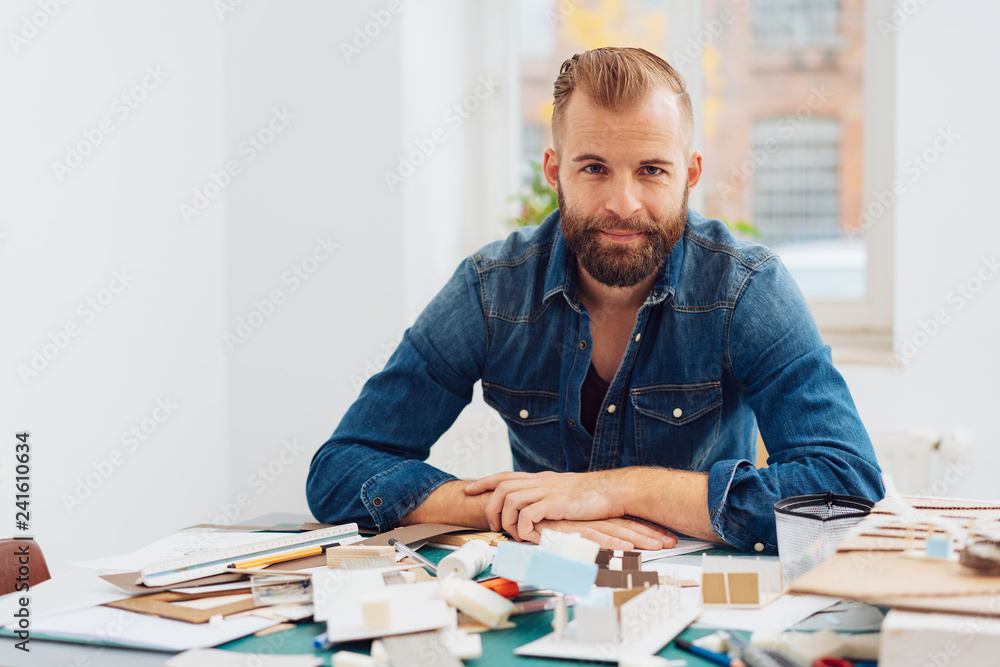 Creative man working in a design studio