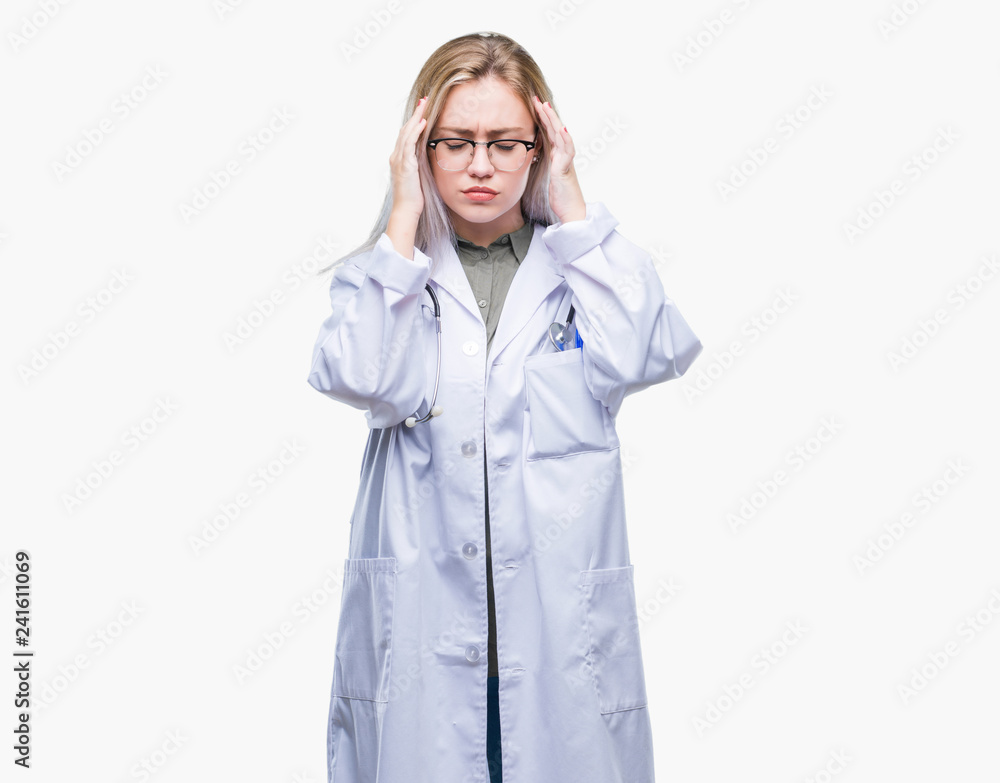 Young blonde doctor woman over isolated background with hand on head for pain in head because stress. Suffering migraine.