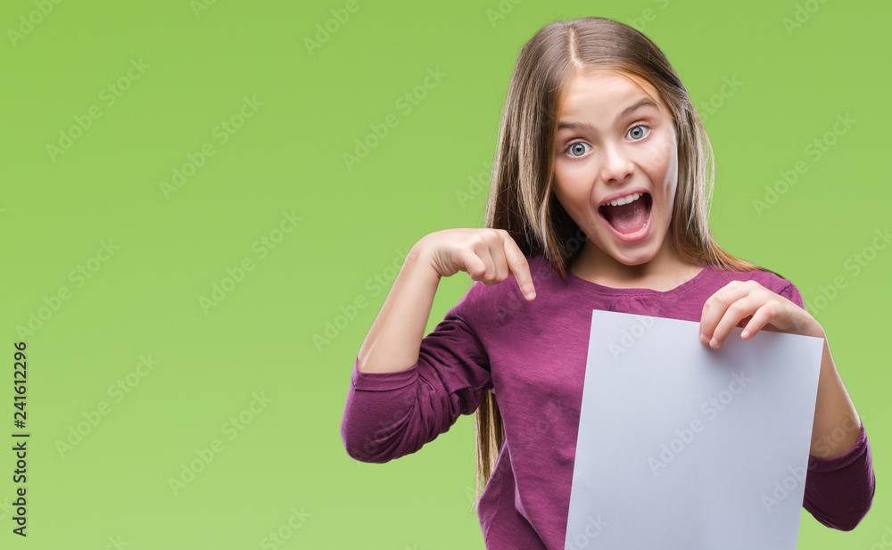 Young beautiful girl holding blank sheet paper over isolated background with surprise face pointing finger to himself - obrazy, fototapety, plakaty 