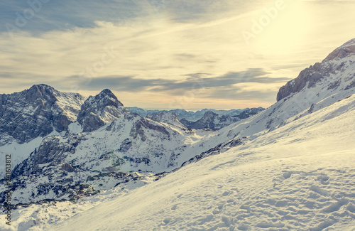 Spectacular winter mountain panorama with peaks covered with early snow. © anzebizjan