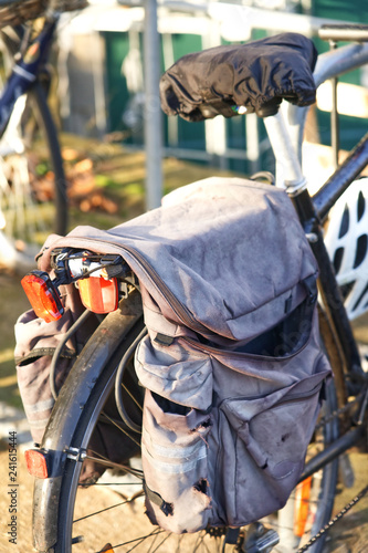 Close up of traditional old canvas panniers on a bicycle