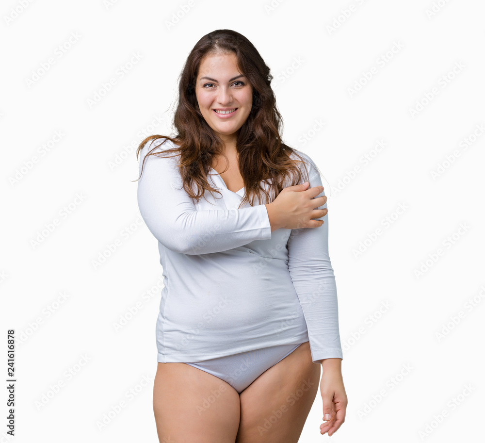 Beautiful plus size young overwight woman wearing white underwear over isolated background with a happy and cool smile on face. Lucky person. Beautiful plus size young overwight woman wearing white underwear over isolated background with a happy and cool smile on face. Lucky person.