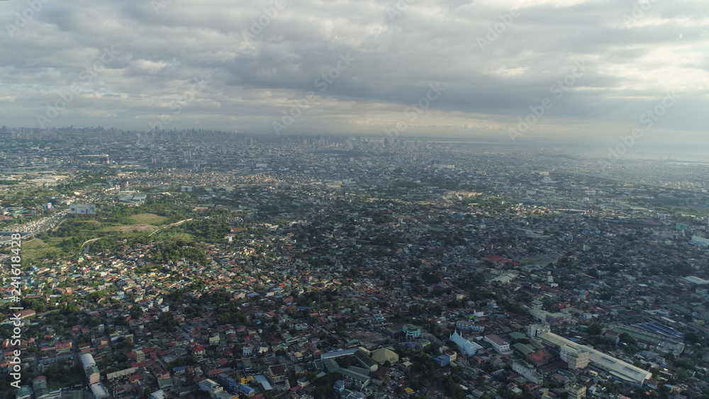 Aerial view of Manila city with skyscrapers and buildings. Philippines, Luzon. Aerial skyline of Manila.