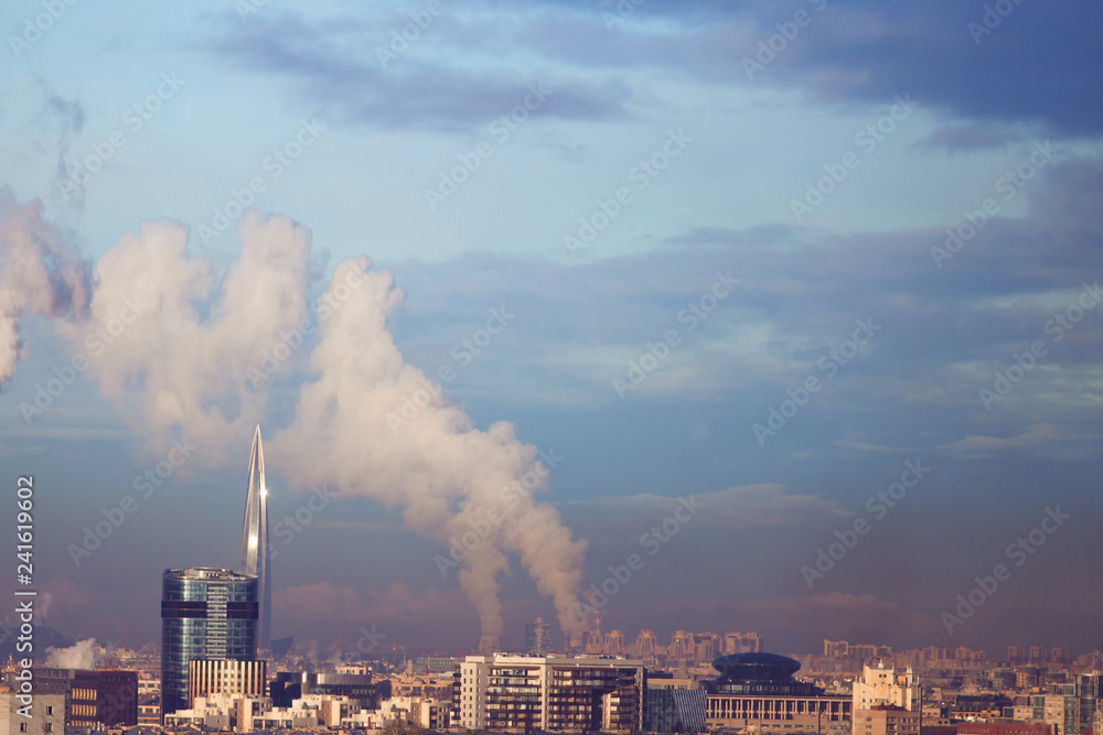 Panorama of St. Petersburg, Lakhta center and smokestacks.