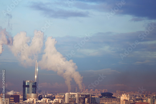 Panorama of St. Petersburg, Lakhta center and smokestacks.