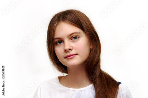 blue eyed brown haired shy girl with flowing hair