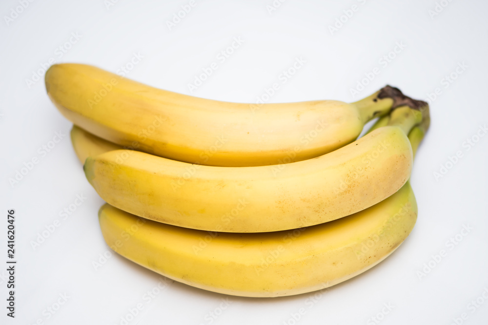 The bunch of bananas fruit on the white background The bunch of bananas fruit on the white background
