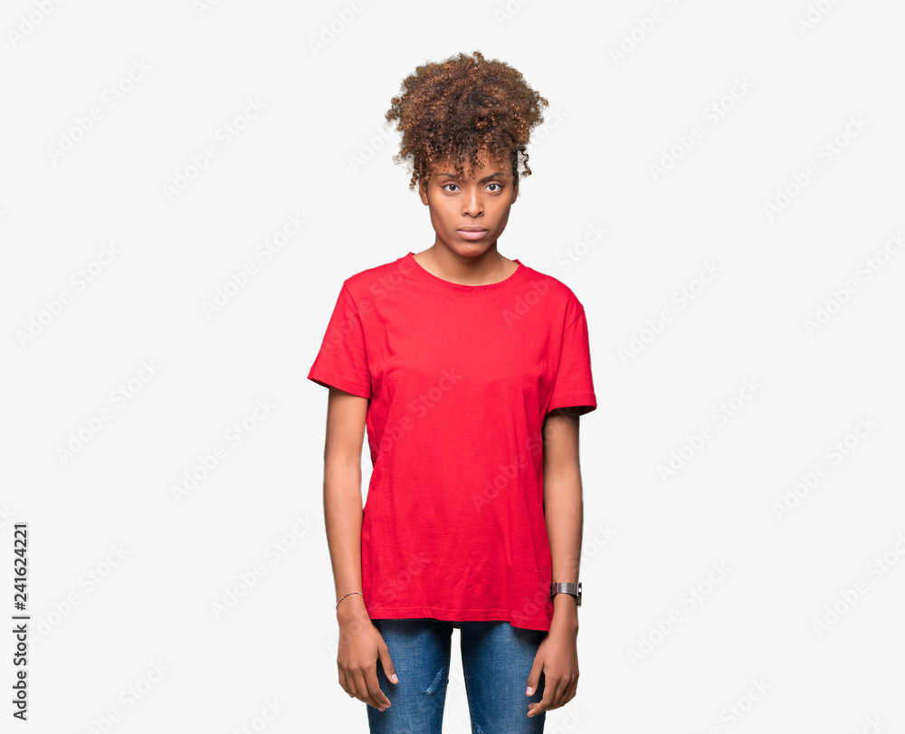 Beautiful young african american woman over isolated background skeptic and nervous, frowning upset because of problem. Negative person. Beautiful young african american woman over isolated background skeptic and nervous, frowning upset because of problem. Negative person.