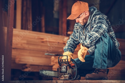 Contractor with a Chainsaw