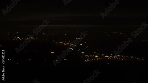 4K footage arial view of flying airlpane through the night light city scene London