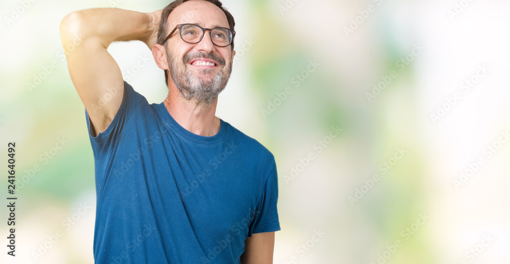 Handsome middle age hoary senior man wearin glasses over isolated background Smiling confident touching hair with hand up gesture, posing attractive Handsome middle age hoary senior man wearin glasses over isolated background Smiling confident touching hair with hand up gesture, posing attractive
