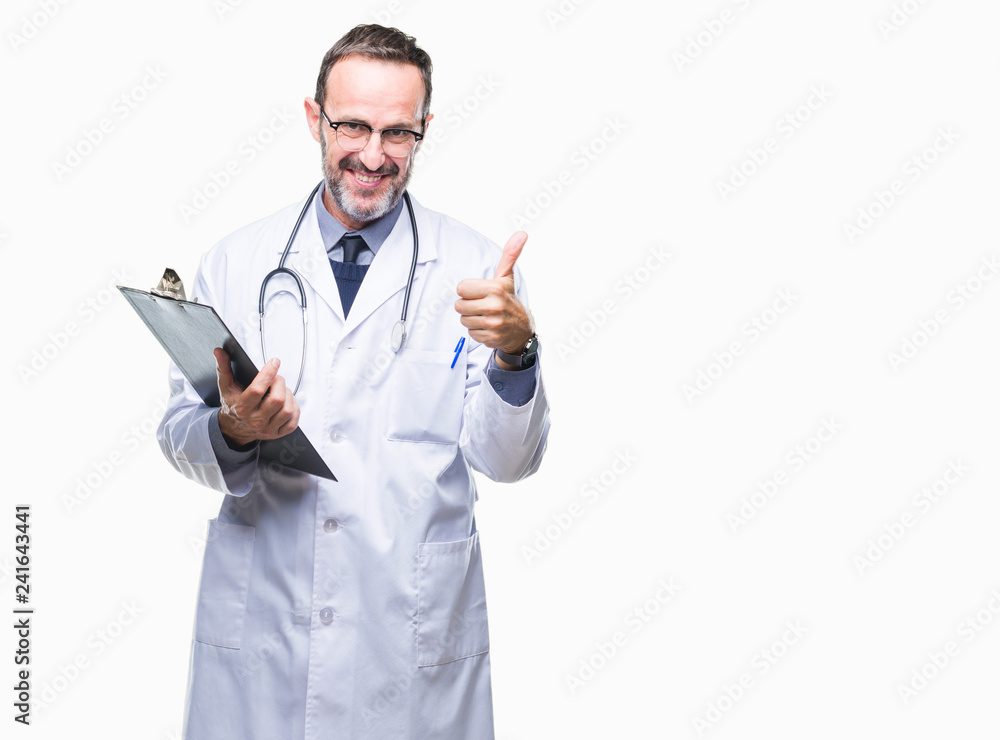 Middle age senior hoary doctor man holding clipboard over isolated background happy with big smile doing ok sign, thumb up with fingers, excellent sign Middle age senior hoary doctor man holding clipboard over isolated background happy with big smile doing ok sign, thumb up with fingers, excellent sign