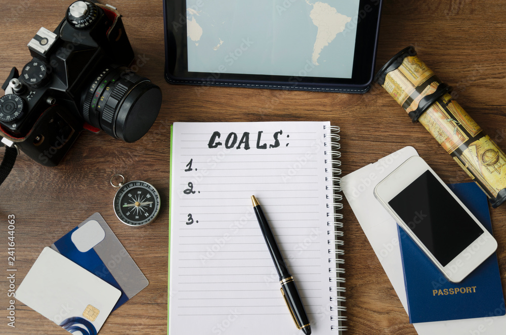 Fototapeta premium notepad, credit cards, passport, ticket, photo camera,