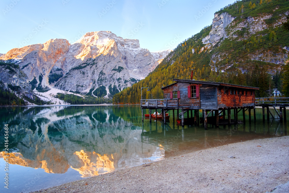 Beautiful Braies lake and house in the background of Seekofel mountain in Dolomites ( Pragser Wildsee )