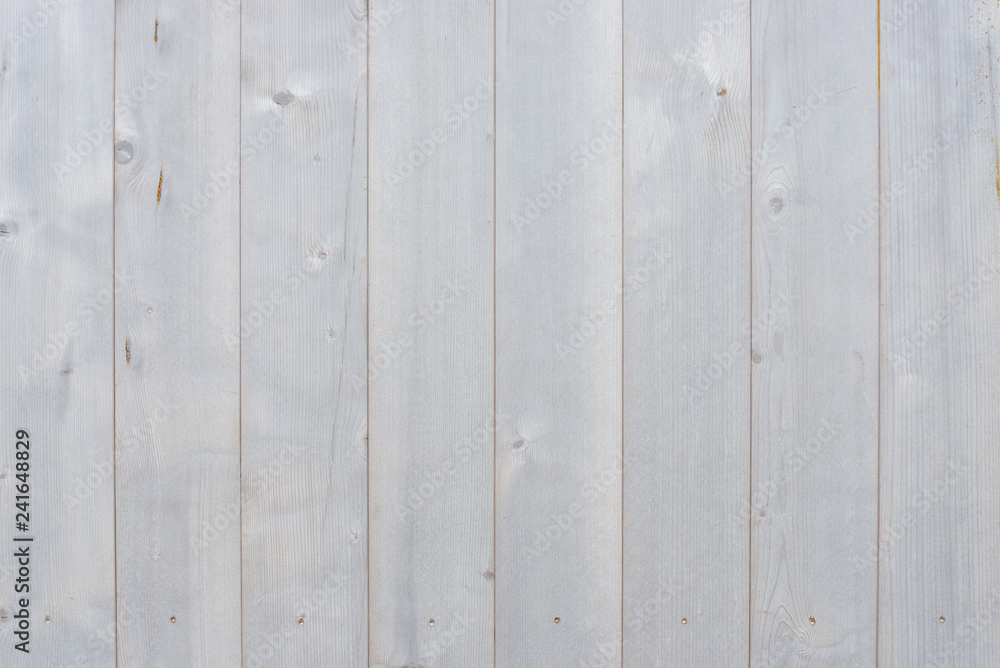 Texture of vertical pale white wooden floor or wall surface. Texture of vertical pale white wooden floor or wall surface.