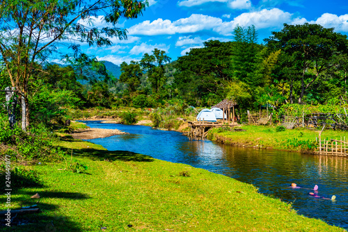 Small canal with mountain in Mueang Khong district photo