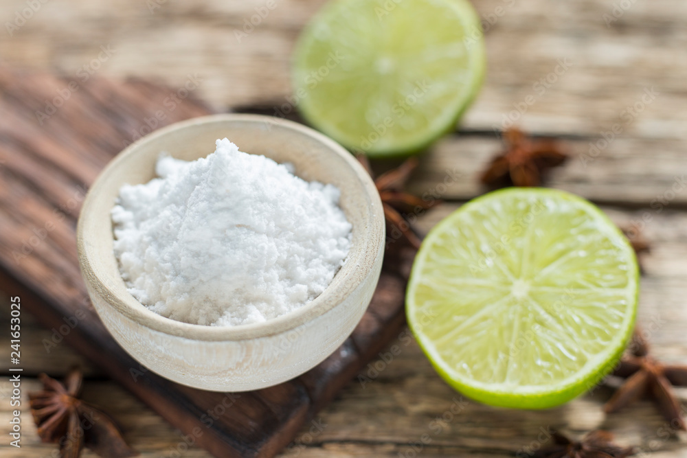 Baking soda and lemon on the table Baking soda and lemon on the table