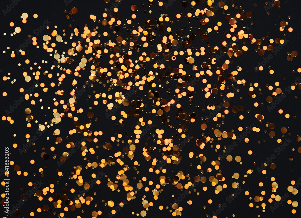 Festive background with glitters.
Festive background with glitters.