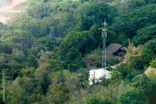 Cellular Base Station and Tower in Rural Area. COPY SPACE.