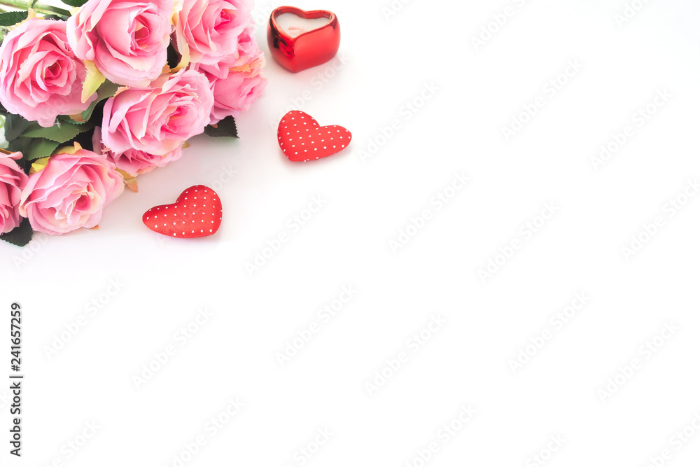 Pink roses and heart on white background Pink roses and heart on white background
