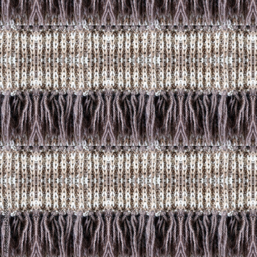 Background of knitted loops and fringe