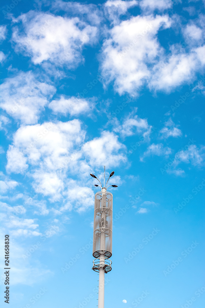 Street light under blue sky and white clouds Street light under blue sky and white clouds