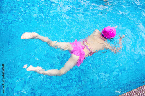 Asian little girl swimming