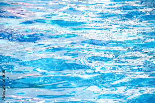 Swimming pool blue water ripples