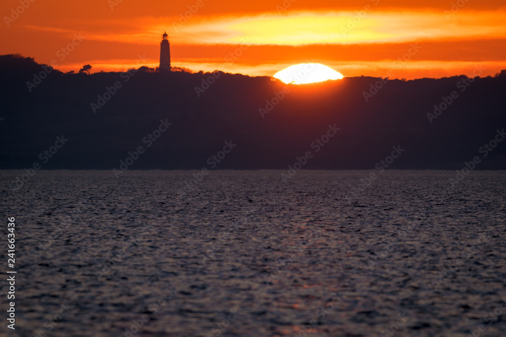 Sonnenuntergang über Ostsee Insel Hiddensee mit Leuchtturm Dornbusch
