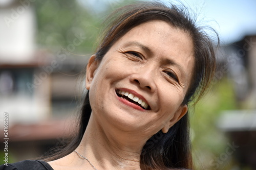 Smiling Older Filipina Female Senior