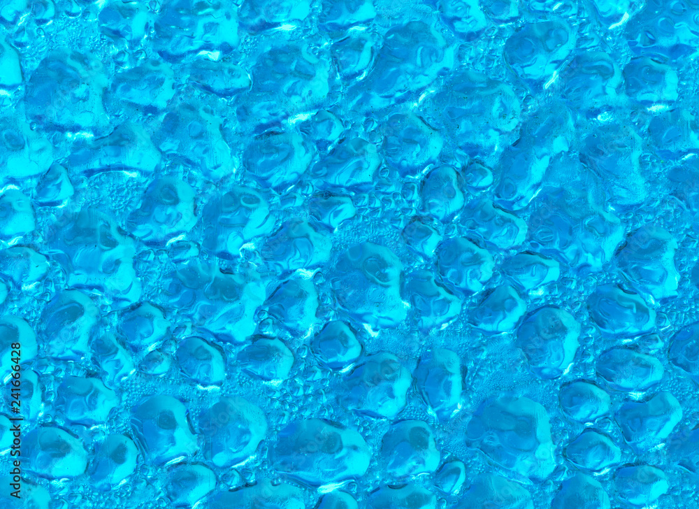 Water drops on a plastic surface. Macro shot. Water drops on a plastic surface. Macro shot.