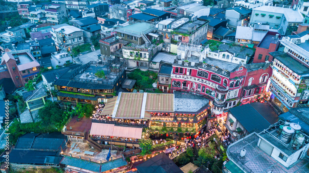 Naklejka premium Jiufen Old Street in Taipei Taiwan, Aerial view Jiufen Old Street at night.