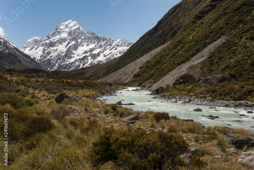 Looking up the Hooker Valley to Mount Cook with the Hooker River in the foreground. Aoraki Mount Cook National Park  New Zealand.