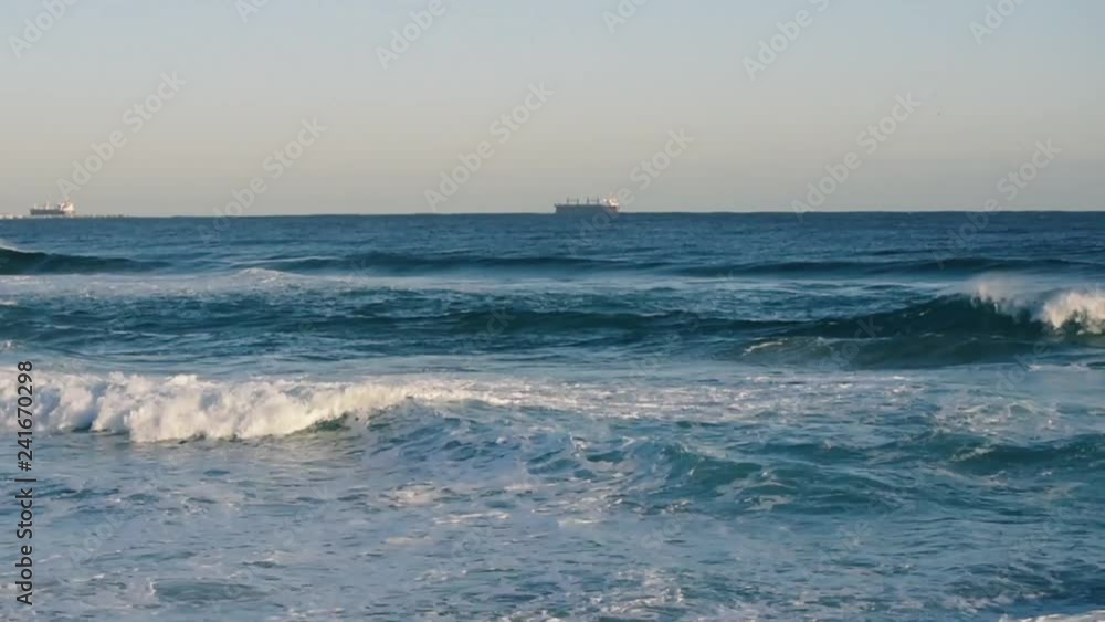 Rough Waves And Blue Sky. Waves of a beach on the East Sea of Korea. Rough Waves And Blue Sky. Waves of a beach on the East Sea of Korea.
