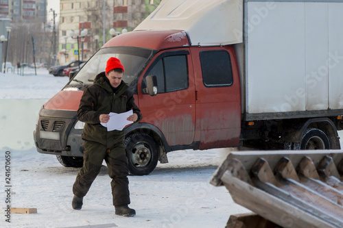 Portrait of a man in a red sports hat