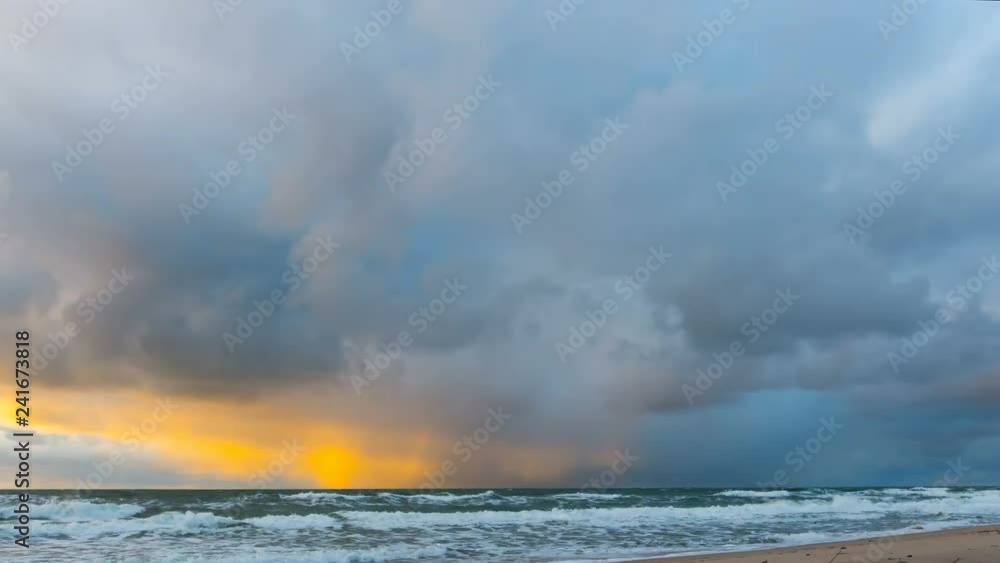 Dark and dramatic storm cloud area background. Time Lapse. Epic storm tropical clouds at sunset. Coast of the Pacific Ocean. Palm beach. Timelapse 4K UHD. Dark and dramatic storm cloud area background. Time Lapse. Epic storm tropical clouds at sunset. Coast of the Pacific Ocean. Palm beach. Timelapse 4K UHD.
