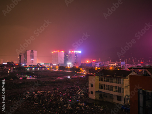 zhangjiajie/China - 13 October 2018:Beautiful city of Zhangjiajie city in the night with the rain in holiday time.zhangjiajie City china travel