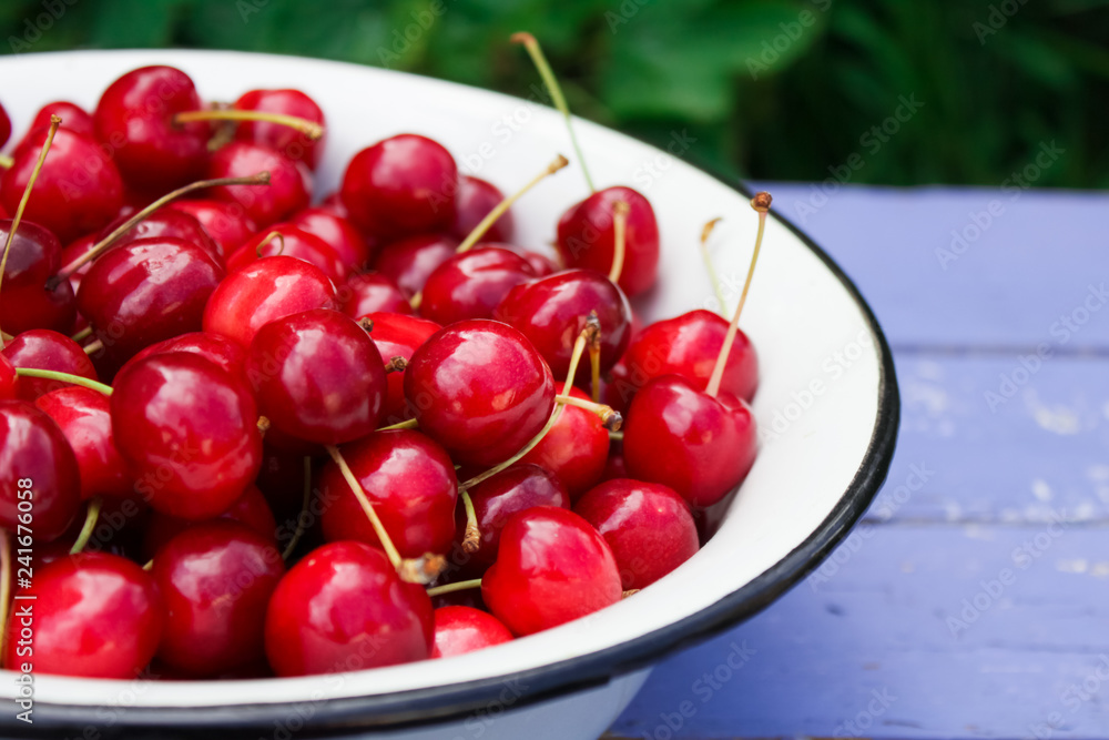 natural organic cherry on wooden background natural organic cherry on wooden background