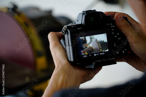 A camera capture student doing capenter in class