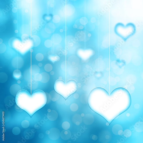 Cyan blue colored hearts hanging on thin white rope on blurry bokeh background. Conceptual valentine day copy space illustration.